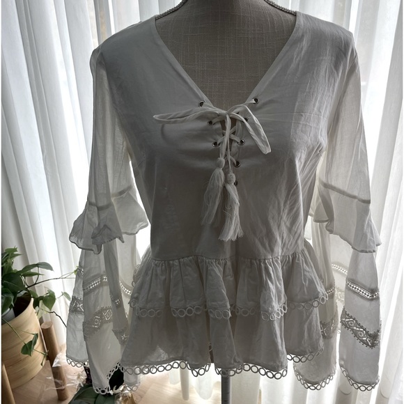 Tops - 2 beautiful shirts. White shirt with bell sleeves the buckle shirt size small